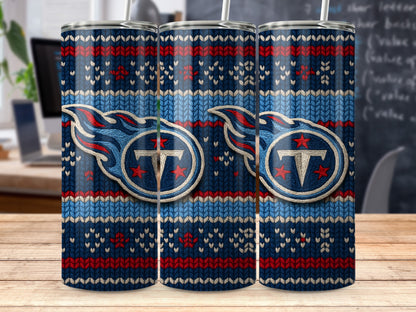 Tennessee Titans logo on a navy blue sweater-patterned tumbler.
