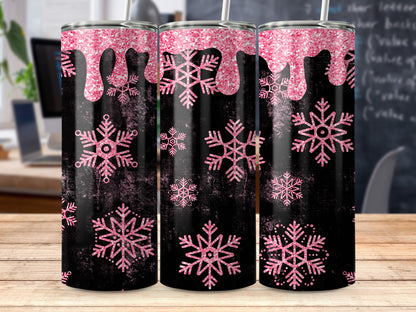 Three tumblers with pink glitter drips and pink snowflakes on a black textured background.