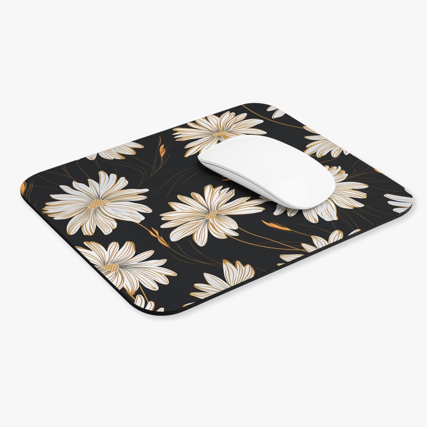 Black mousepad with white and gold floral pattern and a white mouse.