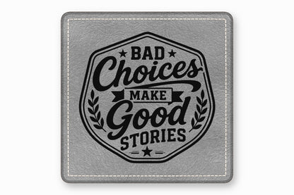 Gray square leather coaster with white stitched edges and the black text Bad Choices Make Good Stories.