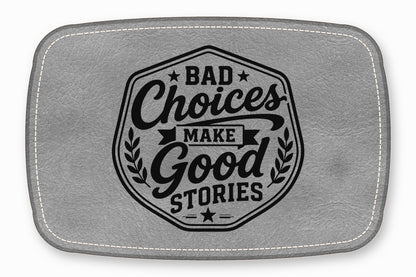 Gray leather patch featuring black text that reads Bad Choices Make Good Stories.