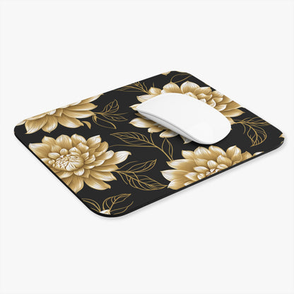 Mousepad with black background and gold floral pattern, featuring a white mouse.