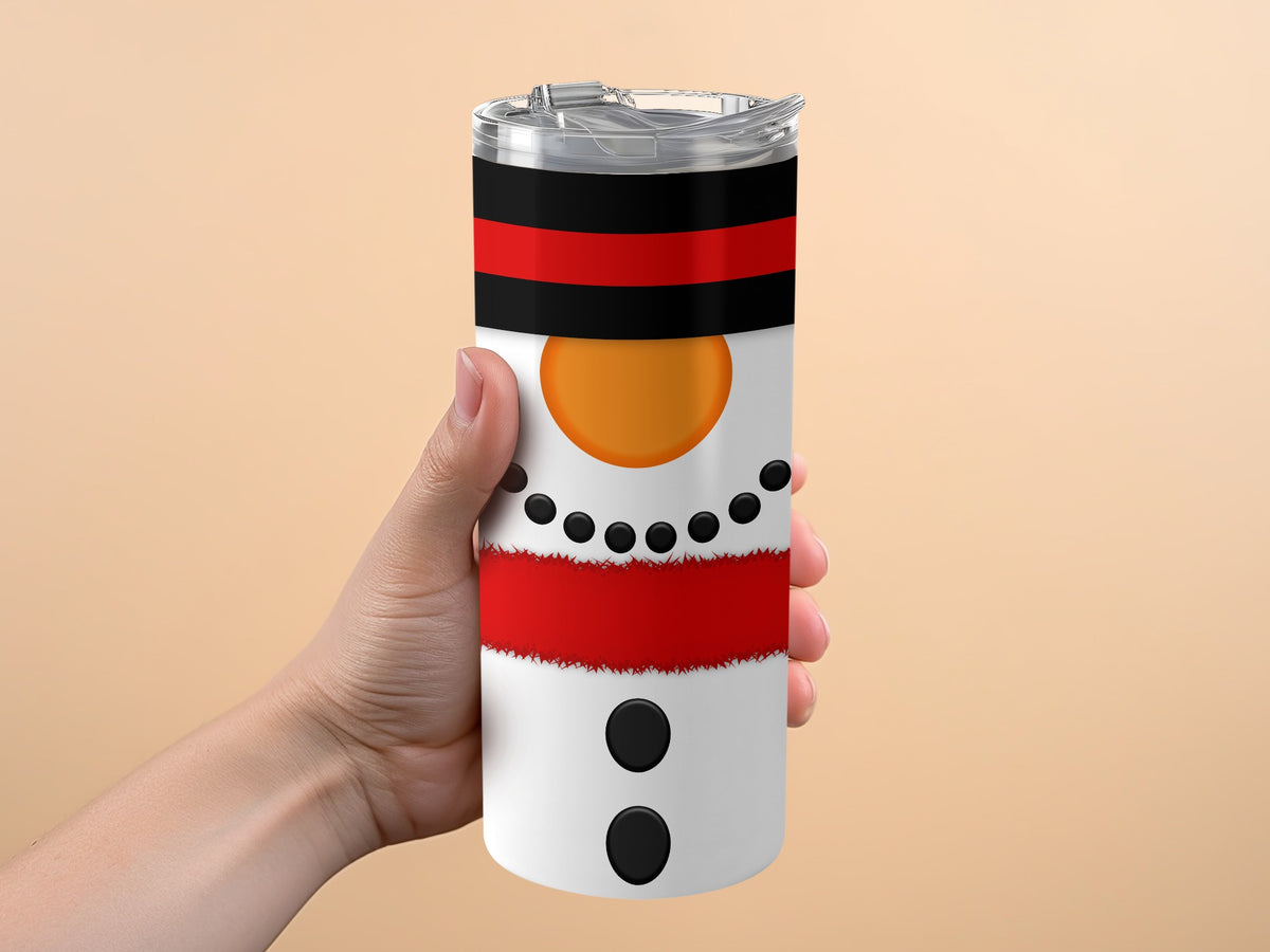 White tumbler with snowman design, black hat, orange nose, and red scarf.