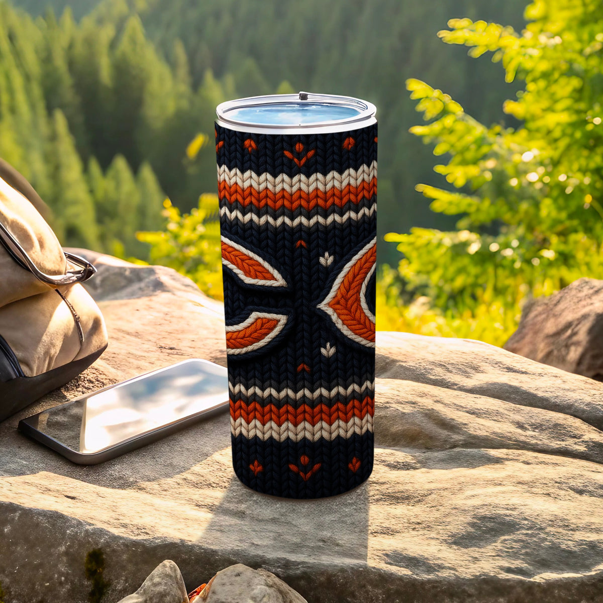 Chicago Bears logo on a black, orange, and white knit pattern tumbler.