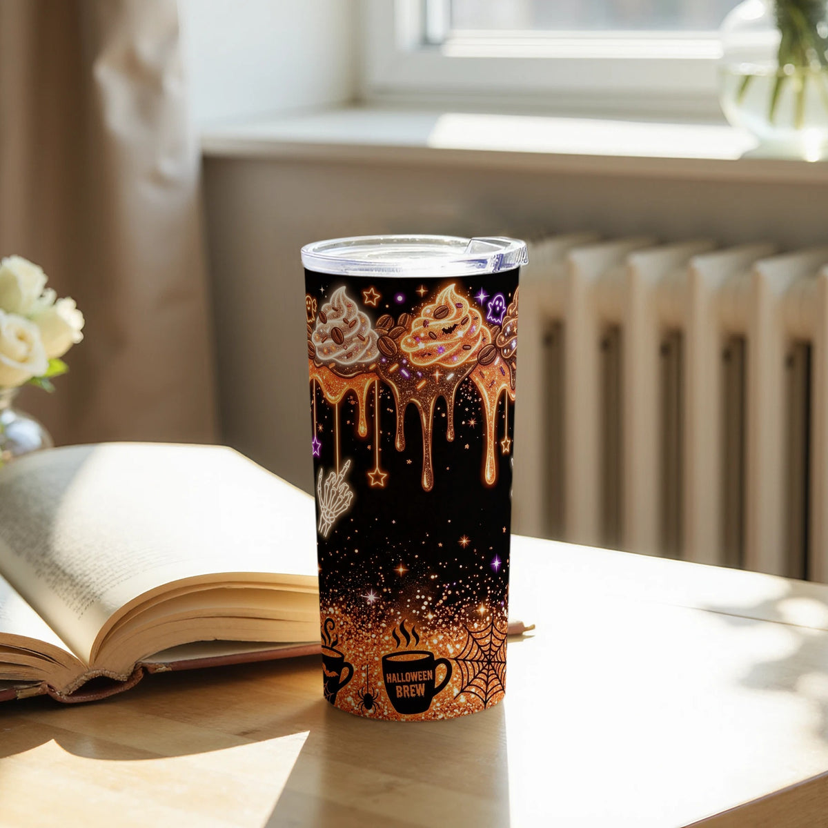 Halloween themed tumbler with coffee, ghosts, and skeleton hand designs.