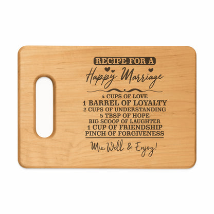Wooden cutting board with "Recipe for a Happy Marriage" engraved.