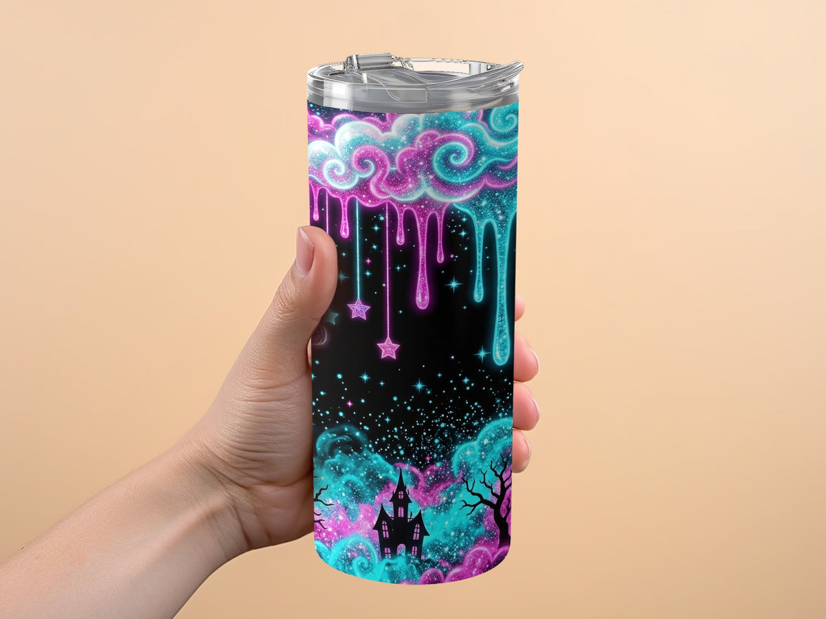 Tumbler with black background featuring a haunted castle, spooky trees, and dripping neon clouds.