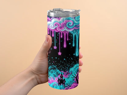 Tumbler with black background featuring a haunted castle, spooky trees, and dripping neon clouds.