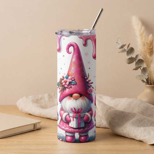 Pink gnome with gifts on a tumbler with a metal straw.