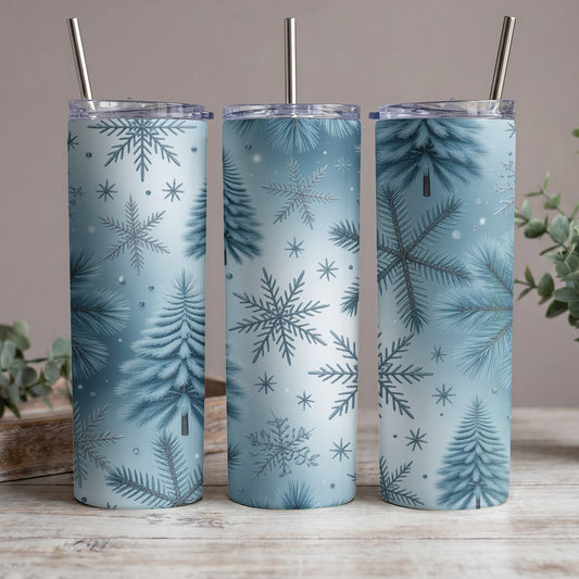 Three tumblers with a blue winter design featuring frosted trees and snowflakes.