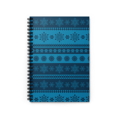 Spiral notebook with blue snowflake and diamond patterns.