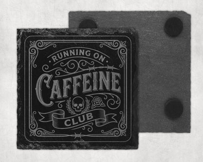 Black slate coaster with "Running on Caffeine Club" text, skull, and rose design.