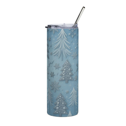 Blue tumbler with a festive winter forest and snowflake pattern, including a metal straw.