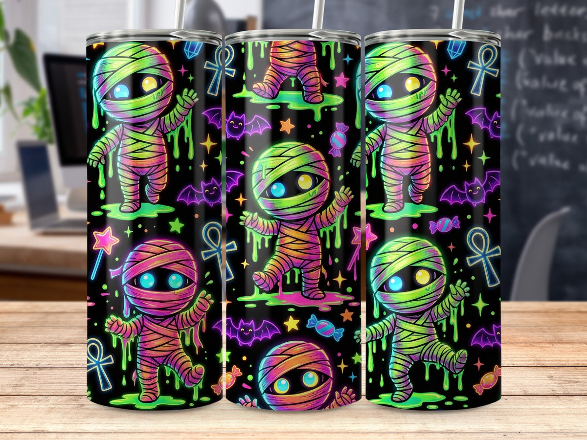 Three tumblers with colorful cartoon mummies and Halloween icons on a black background.