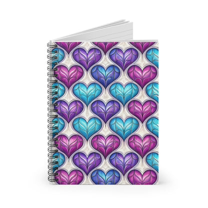 Spiral-bound notebook with a stained-glass heart pattern in pink, purple, and blue.