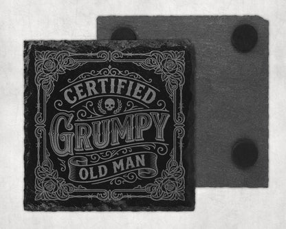 Black slate coaster with "Certified Grumpy Old Man" text and floral design.