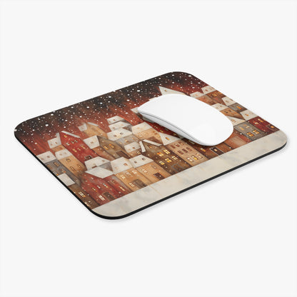 Mousepad with watercolor painting of a cozy, snow-covered village at night.