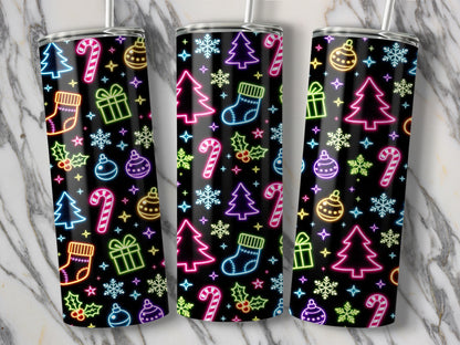 Three tumblers with neon Christmas icons on black background