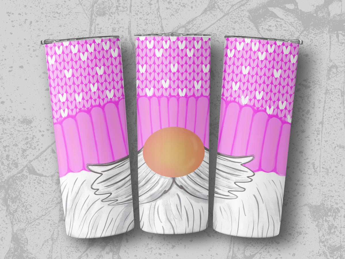Three pink tumblers with a knit pattern and gnome design.