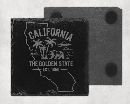 Black slate coaster with California outline, bear, palm trees, and text.