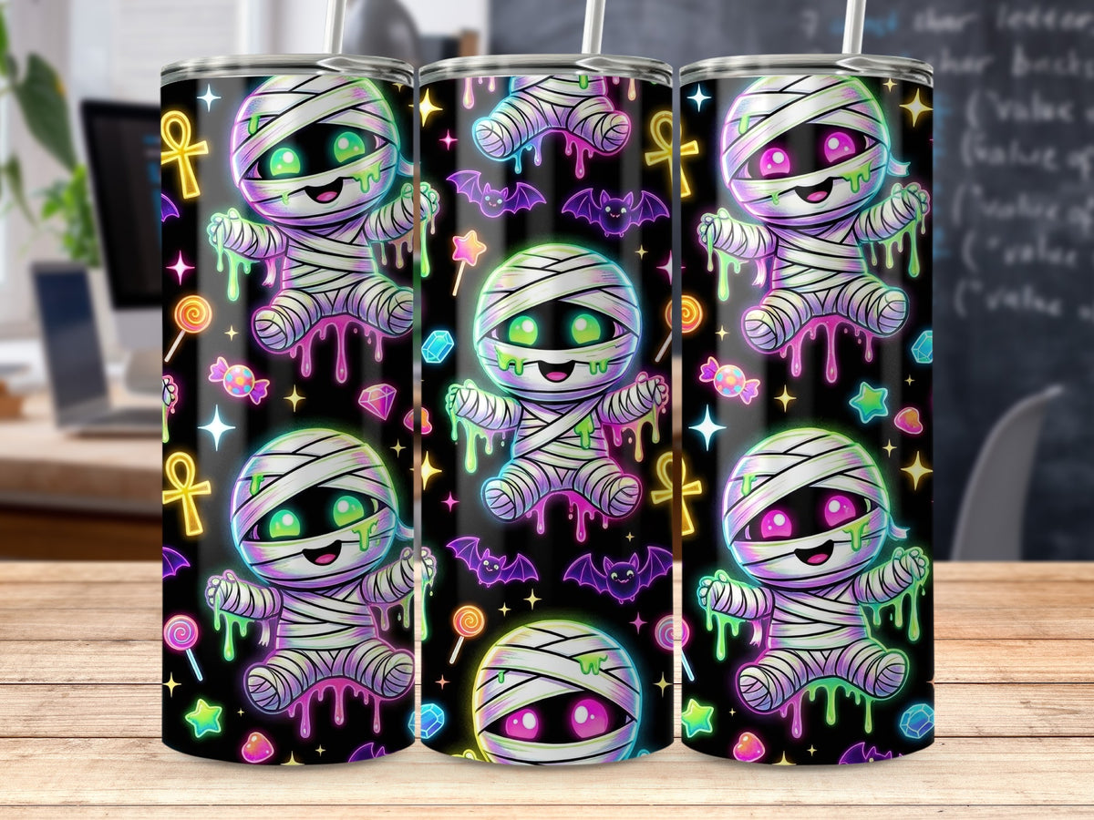 Three tumblers with neon mummy and Halloween candy designs.