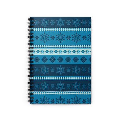 Spiral-bound notebook with a blue and dark blue snowflake pattern.