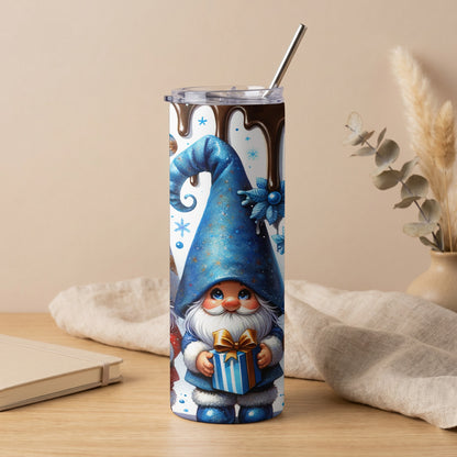 Tumbler with gnome holding gift, blue hat, snowflakes, and chocolate drips.