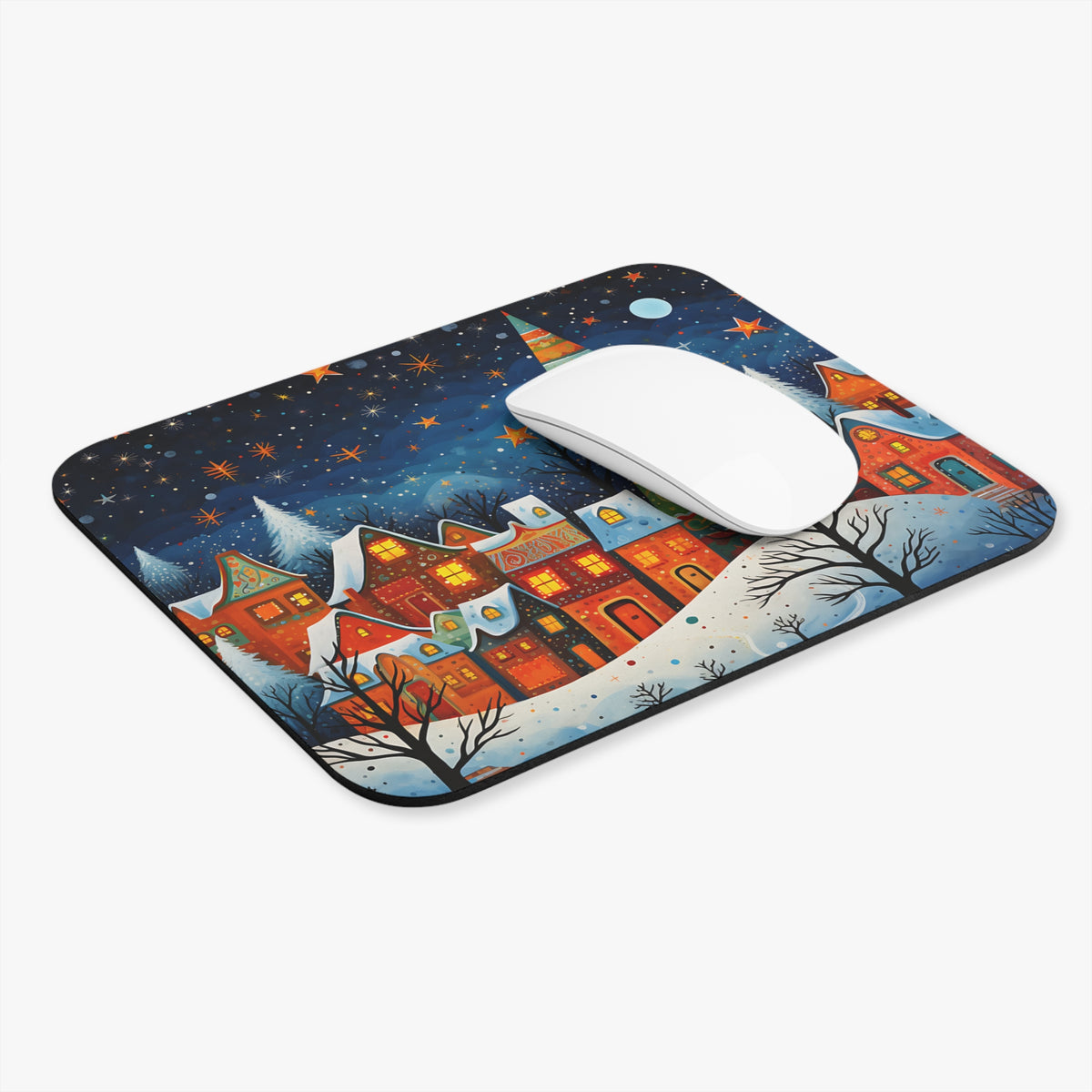 Mousepad with a whimsical winter village and starry night sky design.