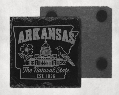 Slate coaster with Arkansas outline, capitol building, flower, bird, and "The Natural State EST. 1836."