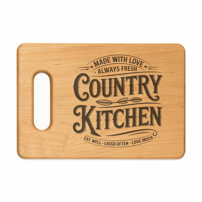 Wooden cutting board with "Country Kitchen" text and "Eat Well, Laugh Often, Love Much".