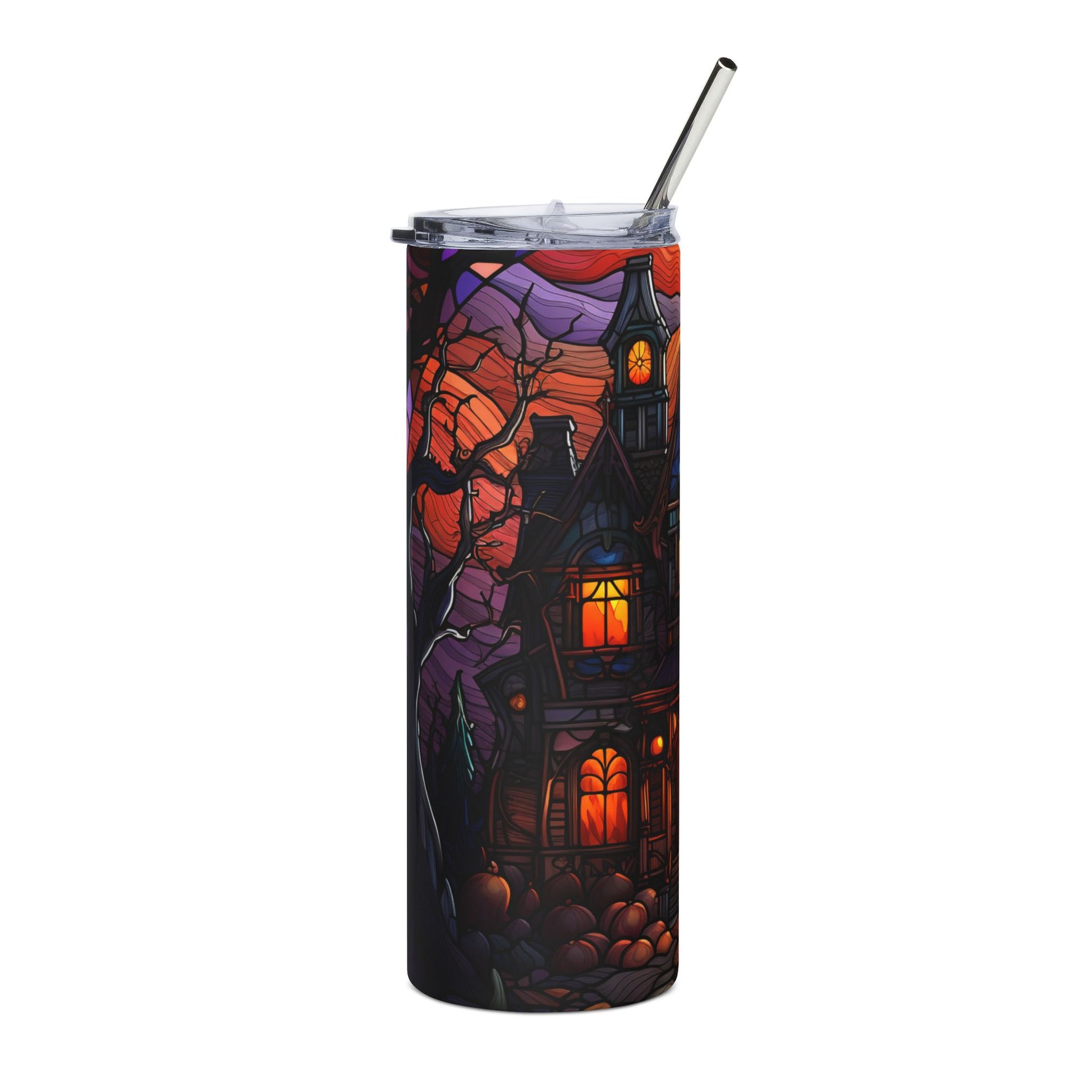 Tumbler with spooky haunted house and pumpkin design.