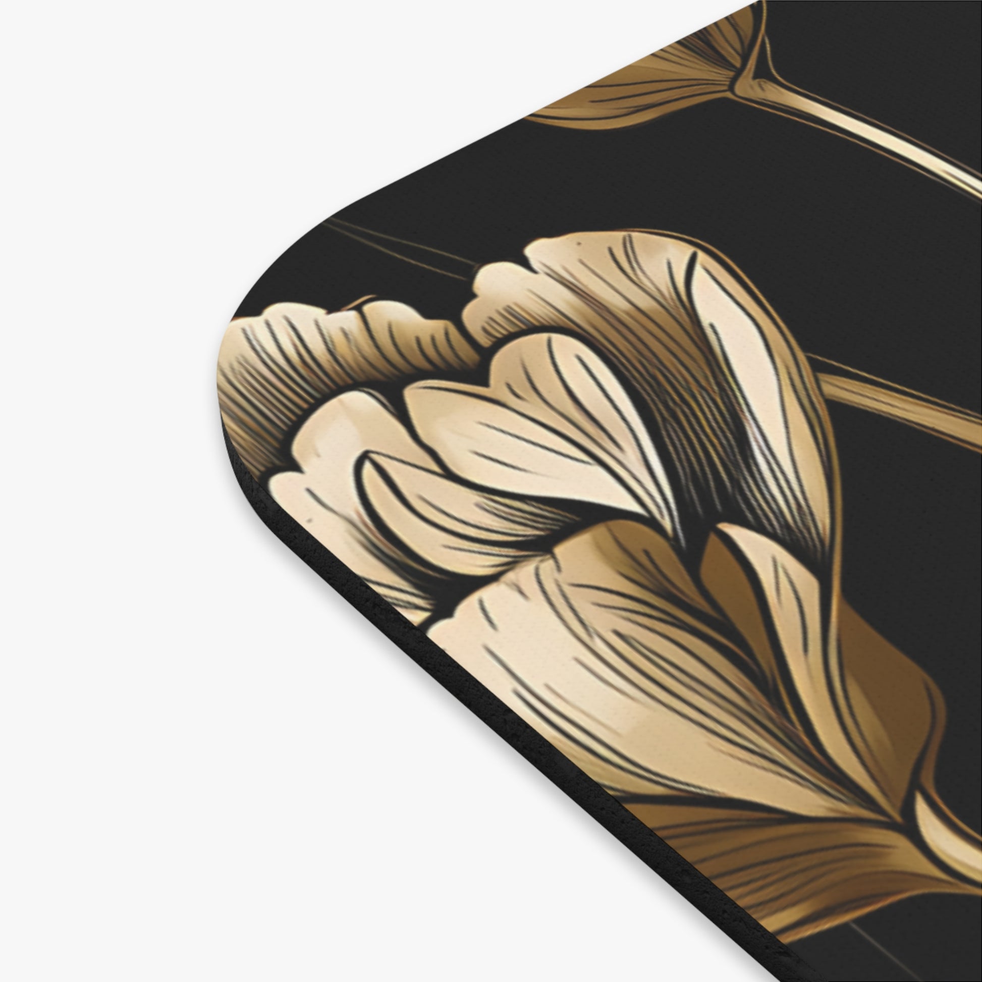 Gold floral design on a black background with a white border.