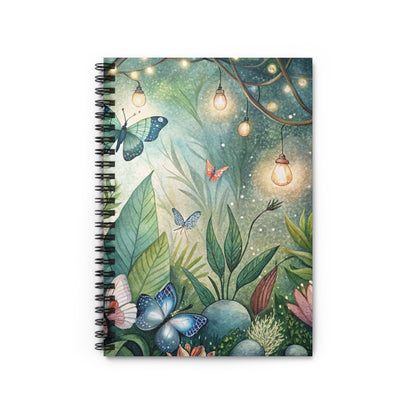 Notebook with watercolor illustration of butterflies and glowing string lights in a garden.