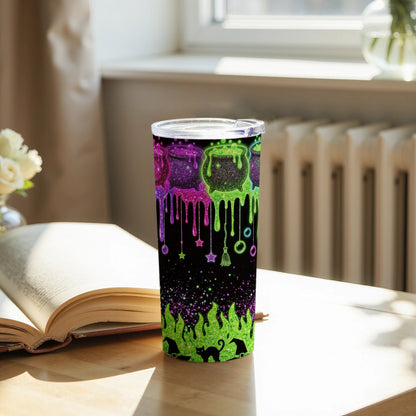 Tumbler with dripping cauldrons, stars, brooms, cats, and witch hats.