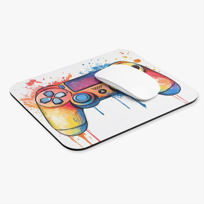 Mousepad with colorful watercolor video game controller art and a white mouse.