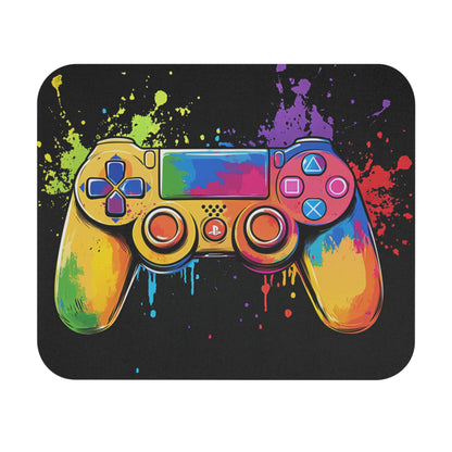 Gaming controller with colorful paint splatters on a black background.