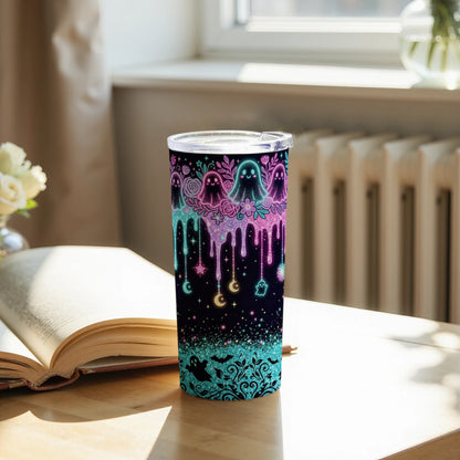 Tumbler with dripping ghost, moons, stars, and bat pattern.