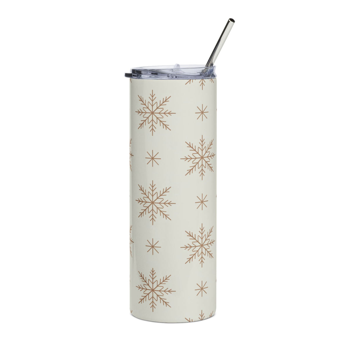 Cream tumbler with a repeating brown snowflake pattern and a metal straw.