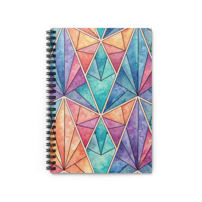 Spiral notebook with a geometric watercolor pattern in blue, purple, pink, and orange.