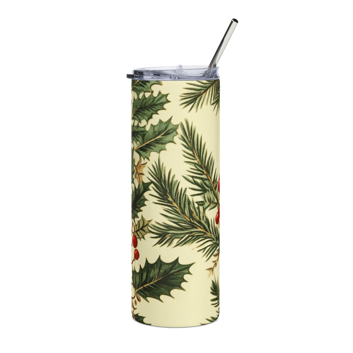 Tall tumbler with a festive holly and pine needle pattern and a silver straw.