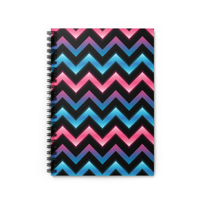 Spiral-bound notebook with a black background and pink-to-blue neon zigzag pattern.