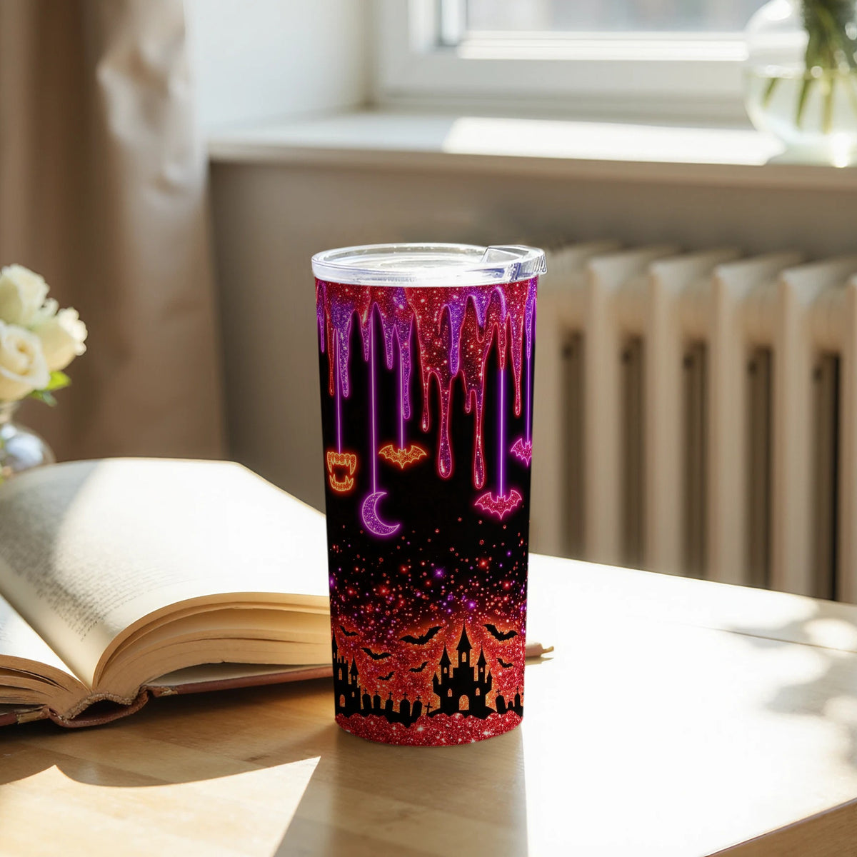 Tumbler with Halloween castle, bats, and moon design.