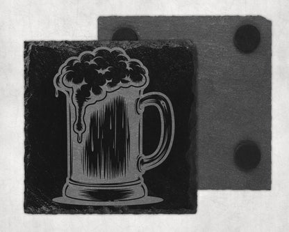 Slate coaster with engraved beer mug design and dark felt backing.
