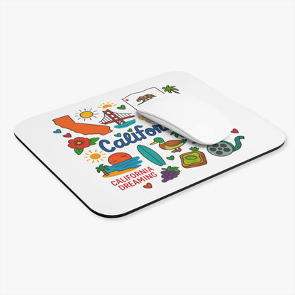 White mousepad with California icons, text "California Dreaming", and a white computer mouse.
