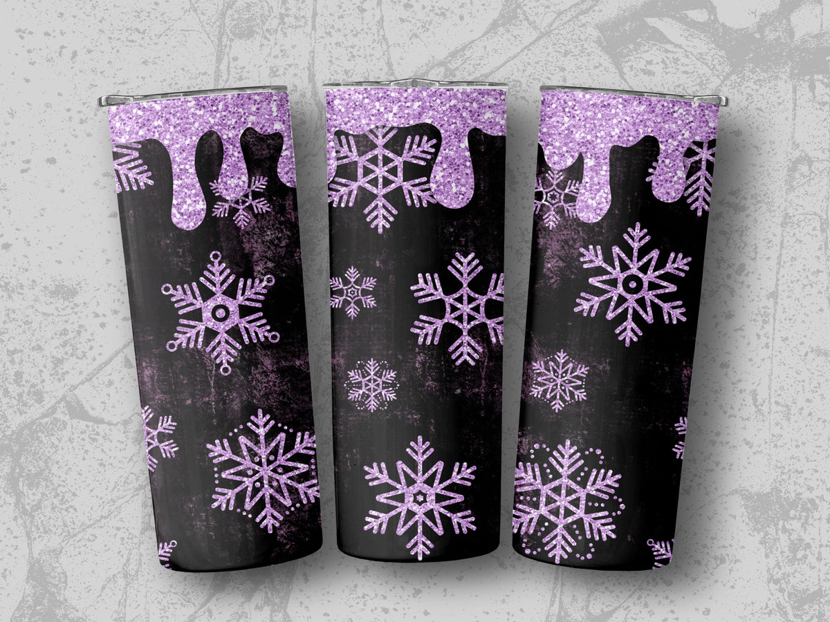 Three black tumblers with glitter purple dripping tops and snowflake designs.