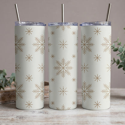 Three tumblers with a light background and a repeating snowflake pattern.