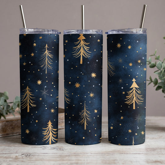 Three tumblers with a dark blue starry night and gold Christmas tree pattern.