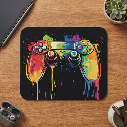 Controller with rainbow paint splatters and drips on black background.
