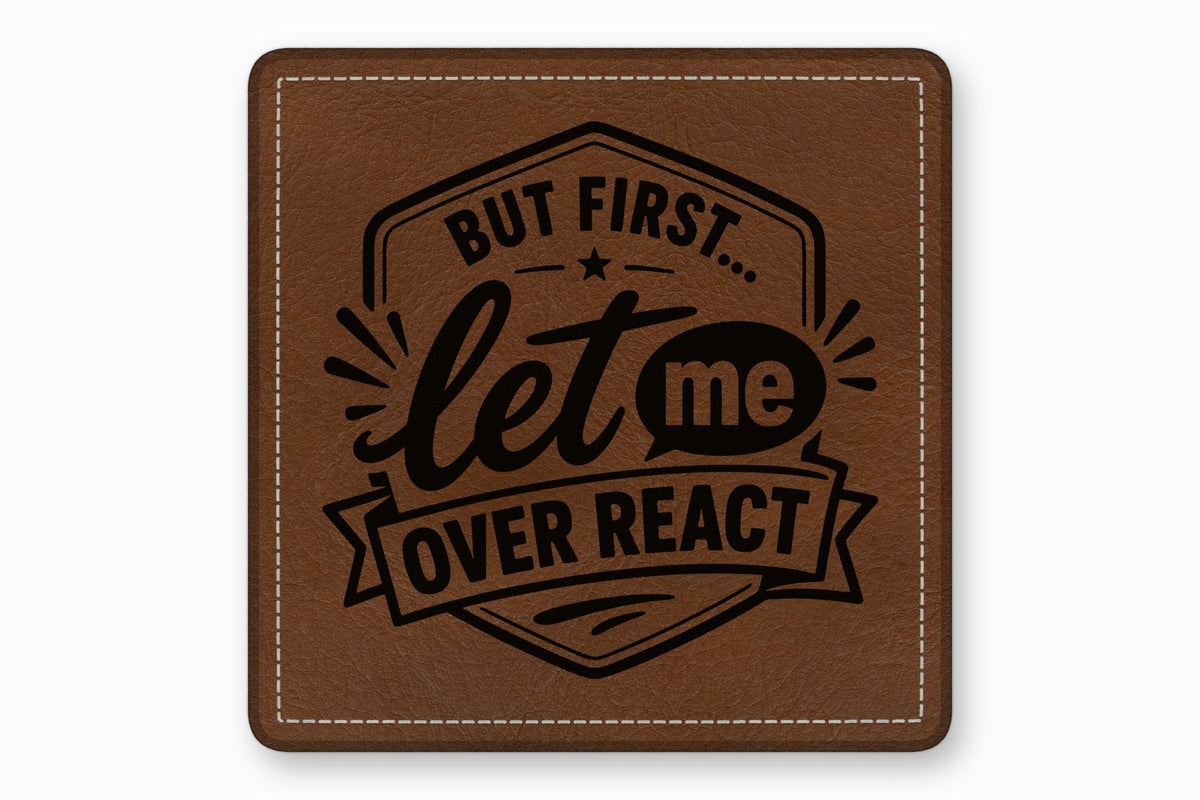 Square brown leather patch with white stitched border, featuring the text But First... Let Me Overreact.