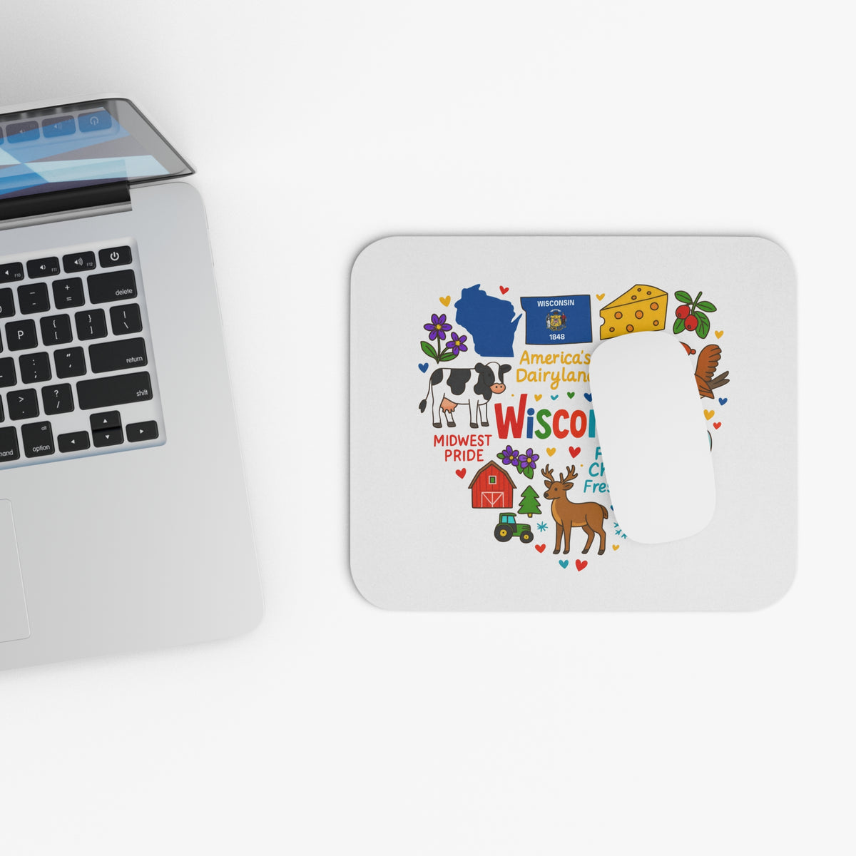 White mousepad with Wisconsin theme: state outline, flag, cow, cheese, barn, deer, and tractor.